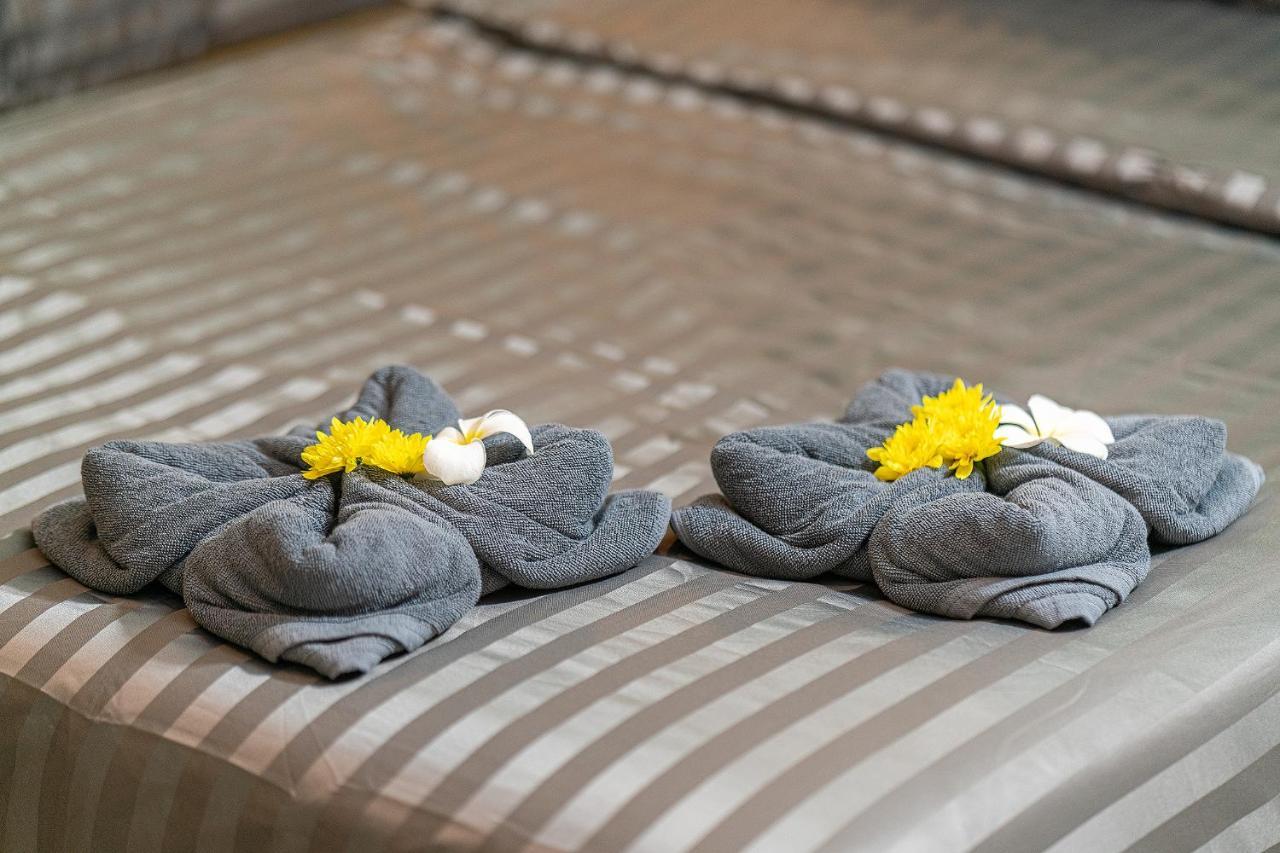 טונגסלה The Cosy Sunset Beach Resort & Restaurant מראה חיצוני תמונה